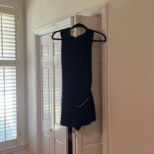 Dark blue romper with skirt